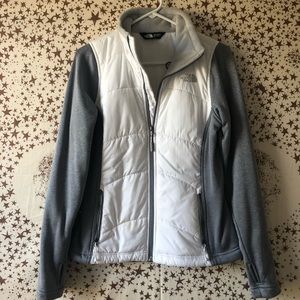 Gray and white North Face zip up jacket